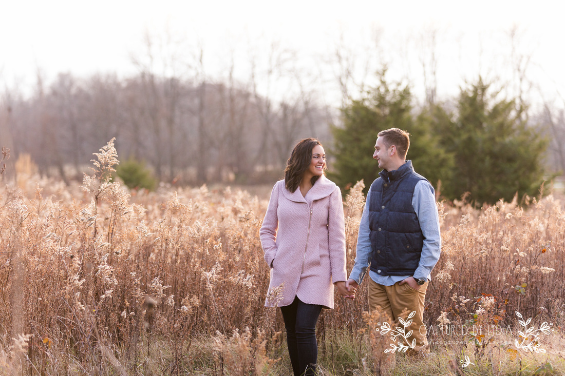 Engagement pictures in a field